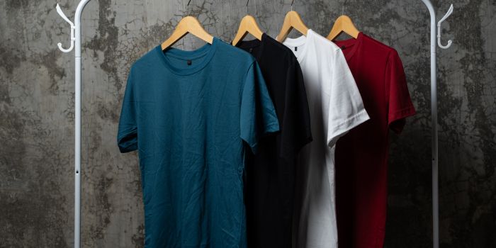different shirts hanging on a rack